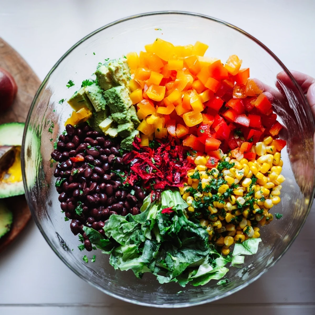 Freshly assembled Southwest Sunset Palette featuring colorful bell peppers, cheese, and a zesty dressing.
