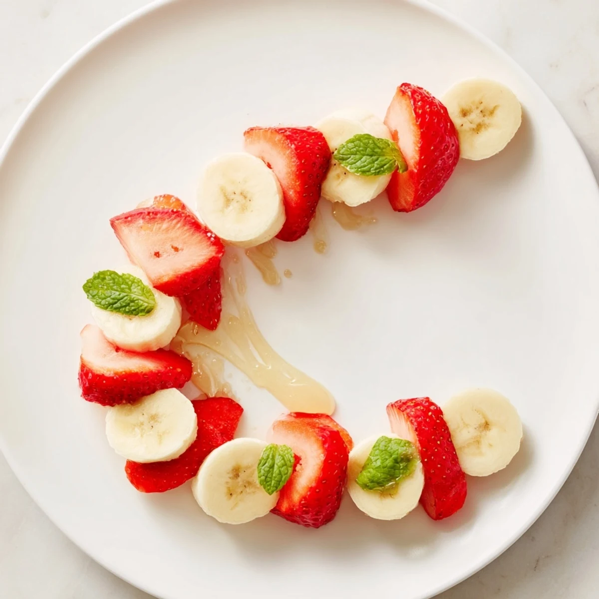 Freshly assembled Banana Strawberry Candy Canes, a sweet and delicious holiday treat ready to enjoy.