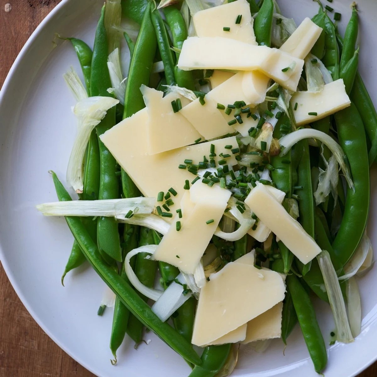The English Ivy salad's crisp green beans and cheddar shards look delicious, ready to serve this salad.