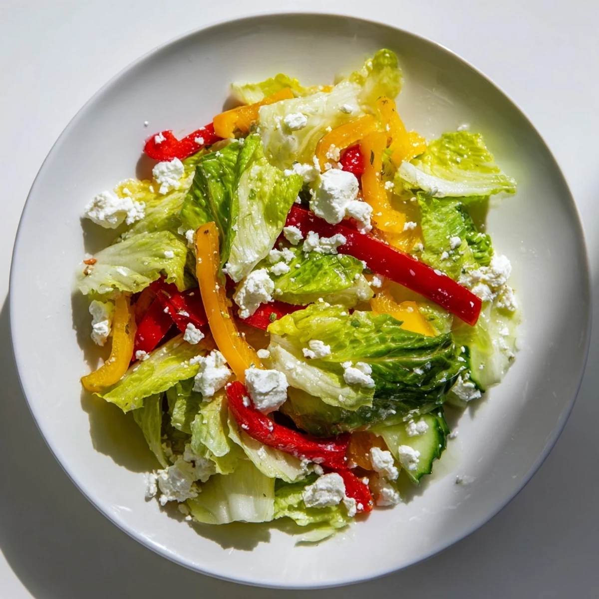 Crisp Bella Hadid Salad, a medley of colorful veggies and creamy feta, ready to enjoy.