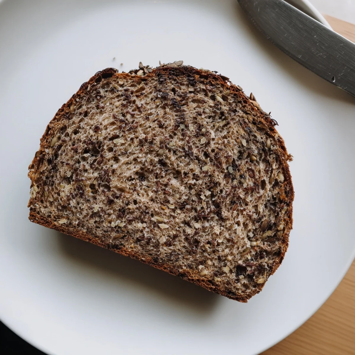 Picture this: a warm Estonian Leib sourdough loaf, ready to be sliced for a delicious meal.