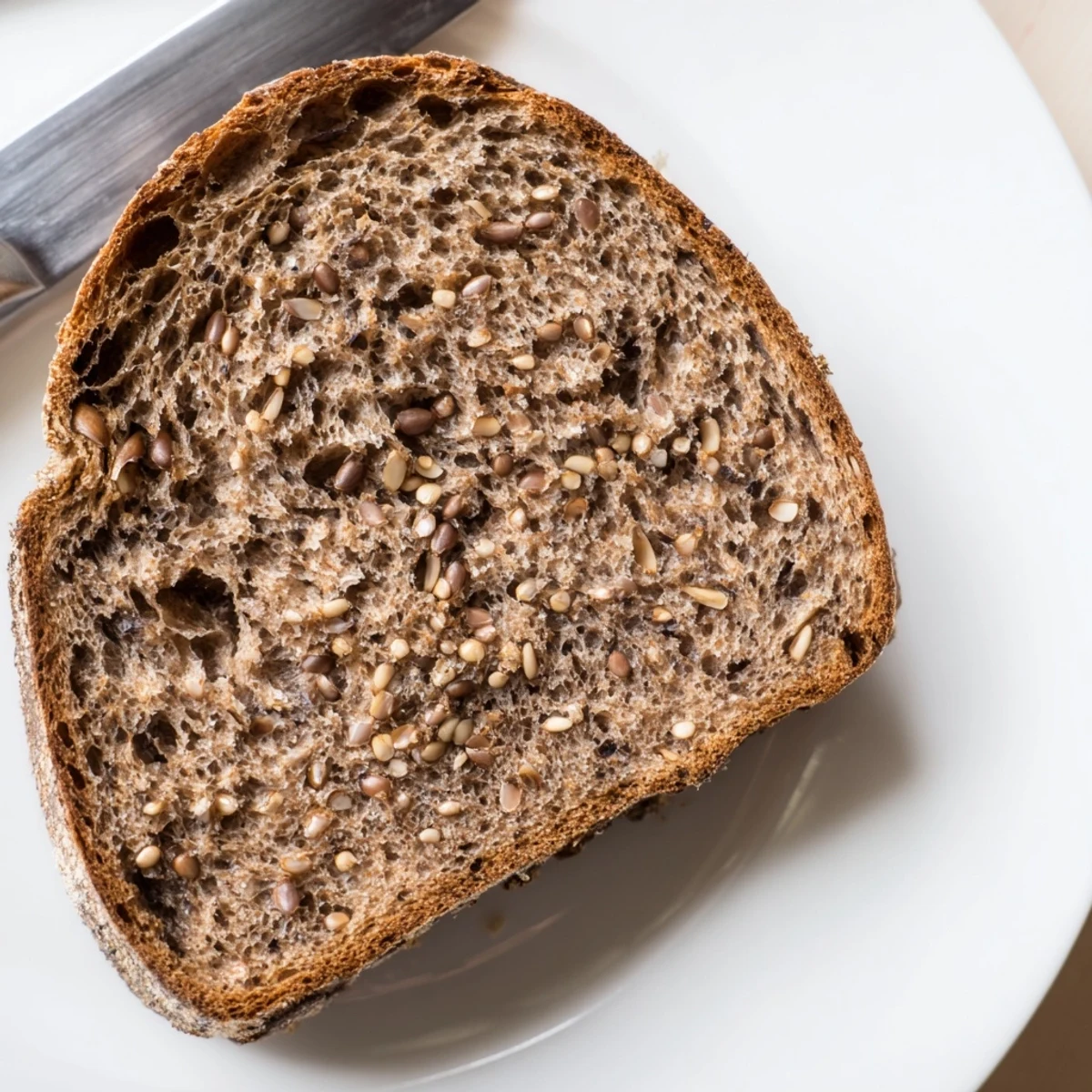 Hearty Estonian Leib sourdough bread, boasting a dense texture, is perfect served with butter and cheese.