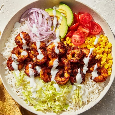 Sizzling Cajun Shrimp Taco Bowls, featuring perfectly spiced shrimp on a bed of fluffy rice.
