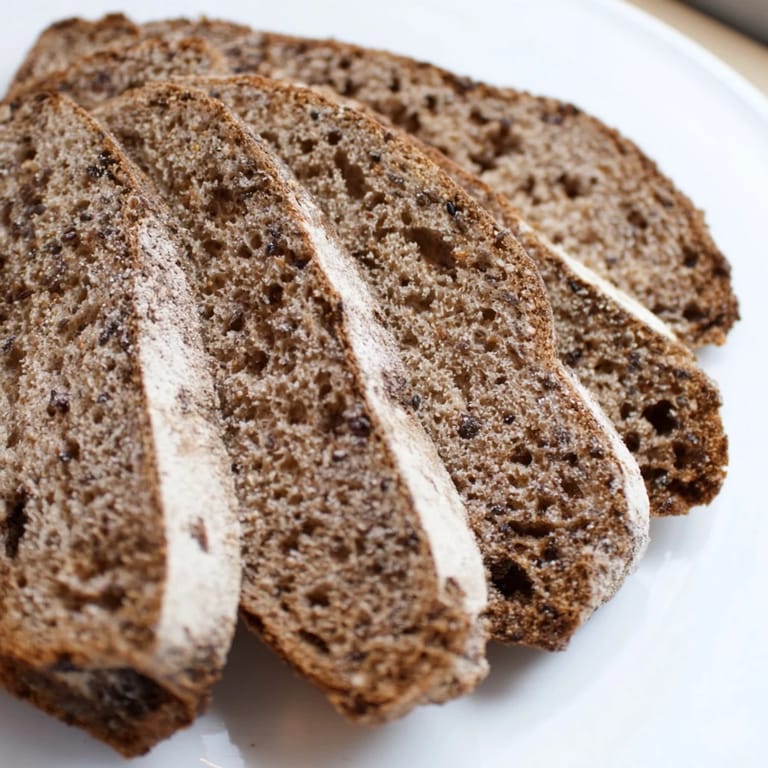 Warm and fragrant, this homemade Latvian Rupjmaize bread is perfect for a delicious sandwich.